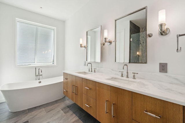 bathroom featuring vanity and separate shower and tub