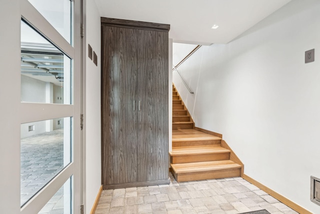 stairway with plenty of natural light