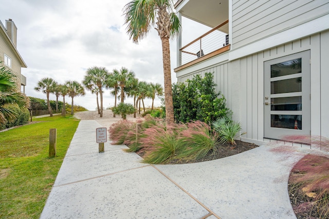 exterior space featuring a lawn and a patio