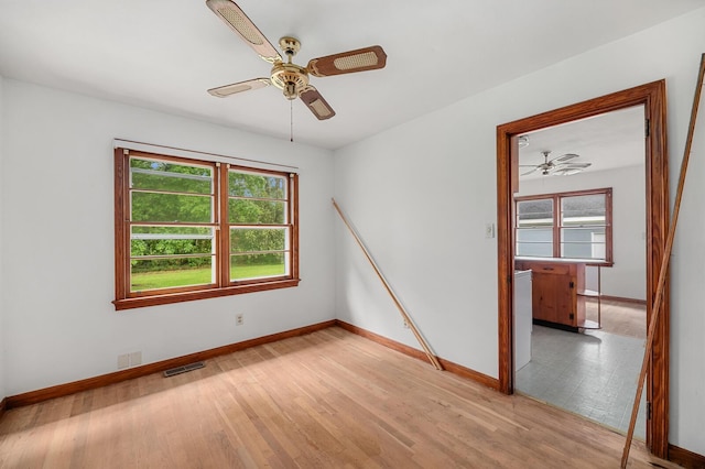 2708 Mawood Ave, North Charleston, SC 29406 - empty room featuring a ceiling fan, baseboards, and light wood-style flooring