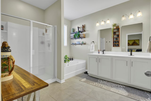 bathroom featuring tile patterned floors, vanity, and independent shower and bath