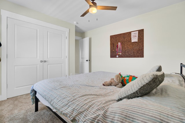 bedroom featuring ceiling fan, carpet floors, and a closet