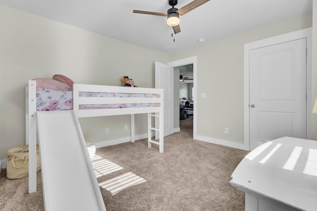 carpeted bedroom featuring ceiling fan