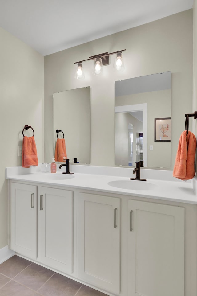 bathroom with tile patterned flooring and vanity