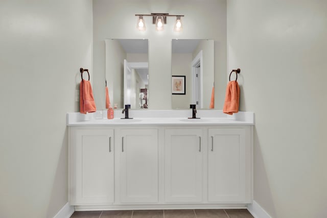 bathroom featuring tile patterned floors and vanity