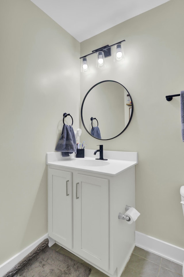 bathroom with tile patterned floors and vanity