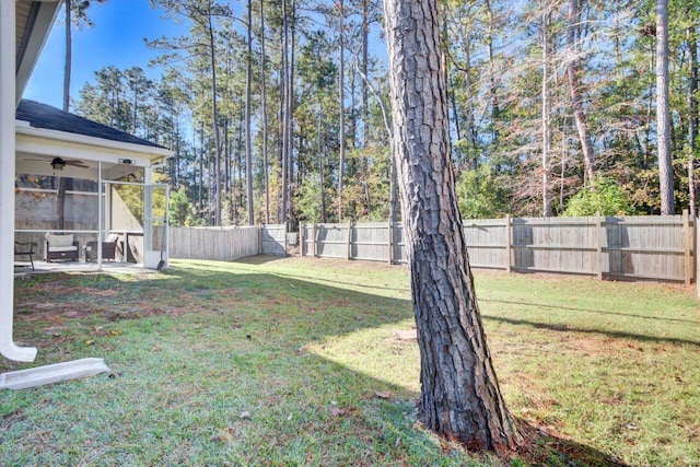 view of yard featuring a sunroom