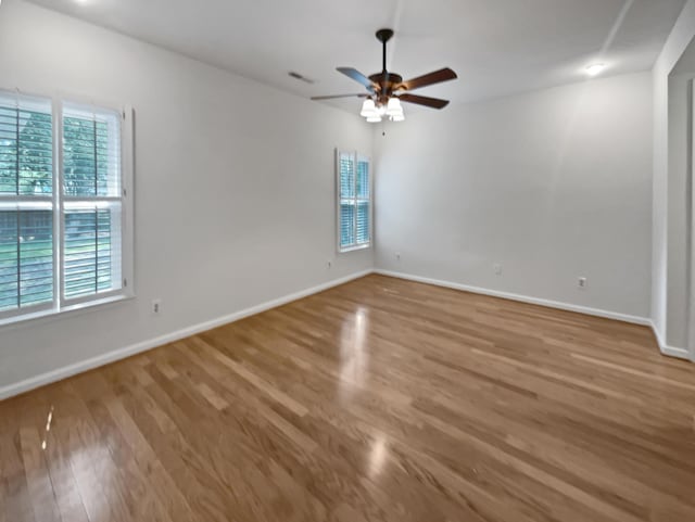 932 Portabella Ln, Charleston, SC 29412 - unfurnished room with wood finished floors, a ceiling fan, and baseboards