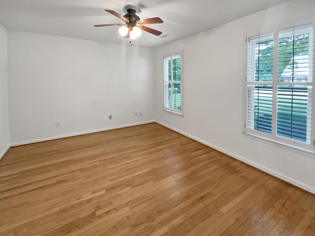 932 Portabella Ln, Charleston, SC 29412 - spare room with light wood-style floors, plenty of natural light, ceiling fan, and baseboards