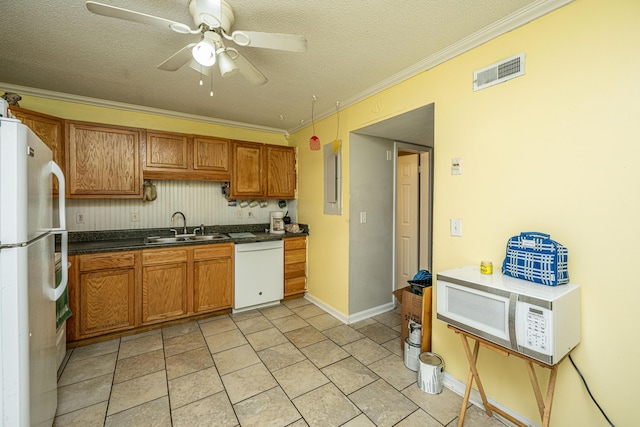 kitchen featuring white appliances, ceiling fan, ornamental molding, and sink