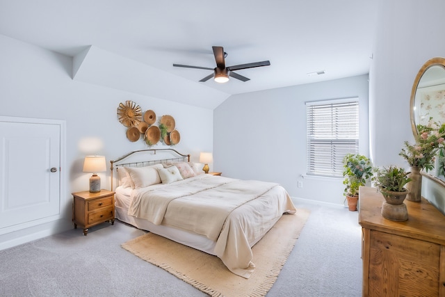 bedroom featuring light colored carpet, ceiling fan, and lofted ceiling