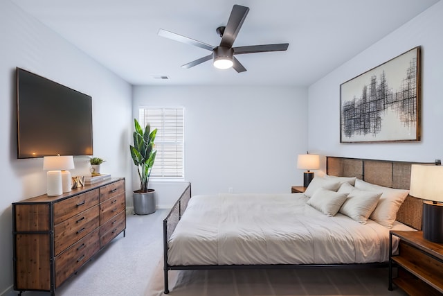 bedroom with ceiling fan and carpet floors