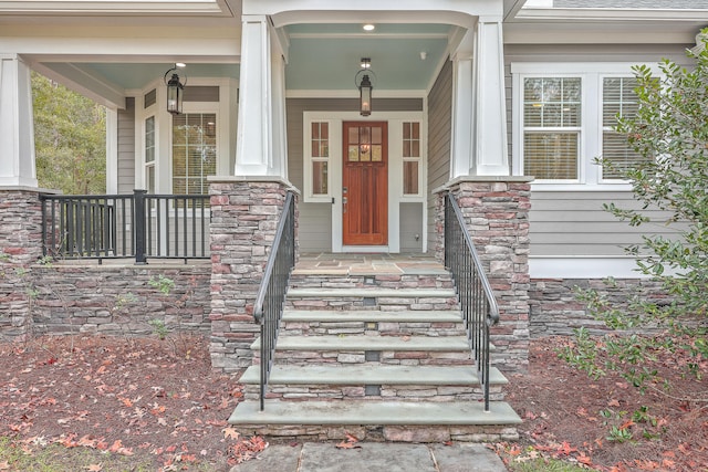 property entrance featuring a porch