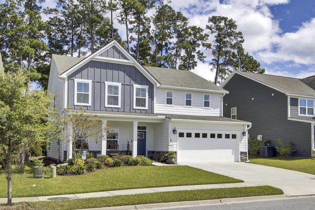 garage featuring electric panel, a garage door opener, and black refrigerator