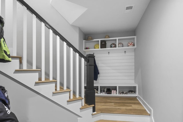 mudroom featuring visible vents and wood finished floors