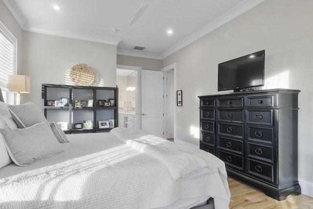 bedroom featuring connected bathroom, recessed lighting, visible vents, light wood-style floors, and ornamental molding