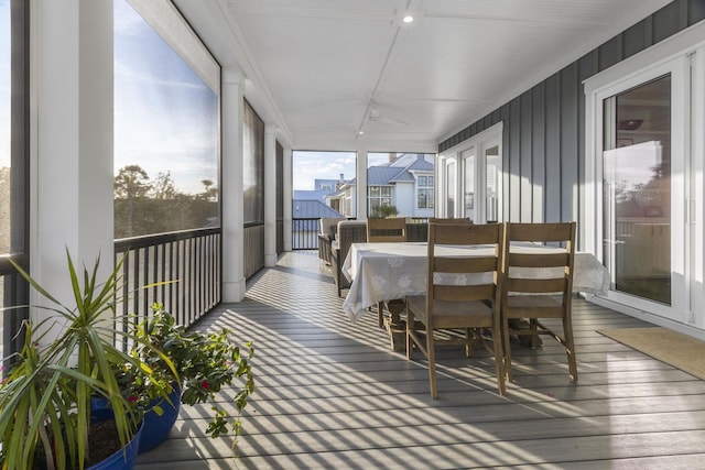 sunroom with track lighting