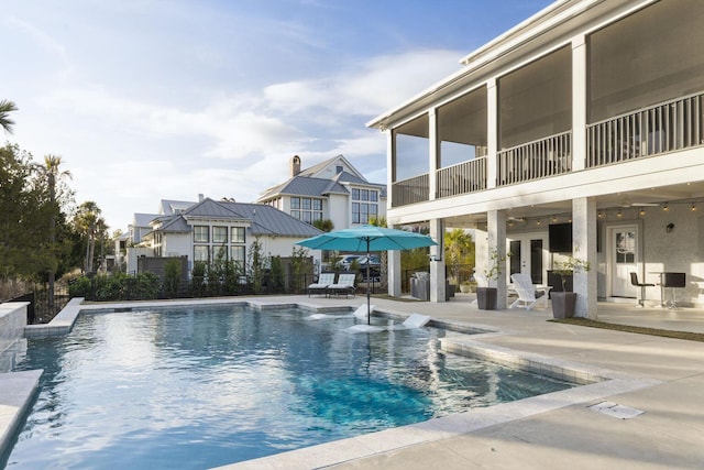 view of swimming pool with a fenced in pool, a patio area, and fence