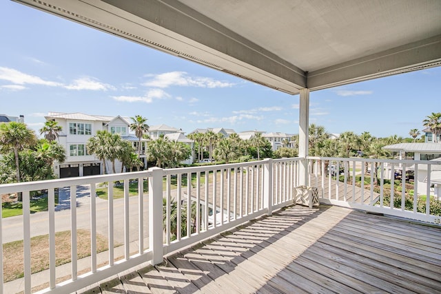 wooden deck featuring a residential view