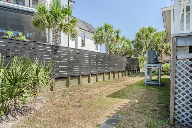 view of yard with central AC