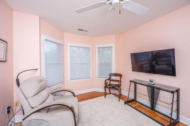 5847 Back Bay Dr, Isle Of Palms, SC 29451 - sitting room featuring wood finished floors, ceiling fan, and baseboards