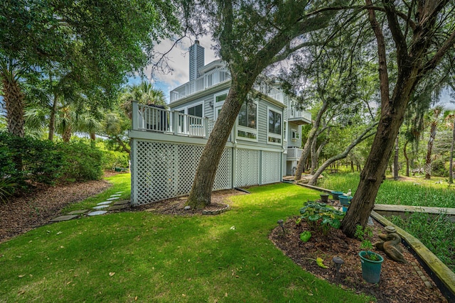 5847 Back Bay Dr, Isle Of Palms, SC 29451 - back of property featuring a yard, a chimney, and a deck