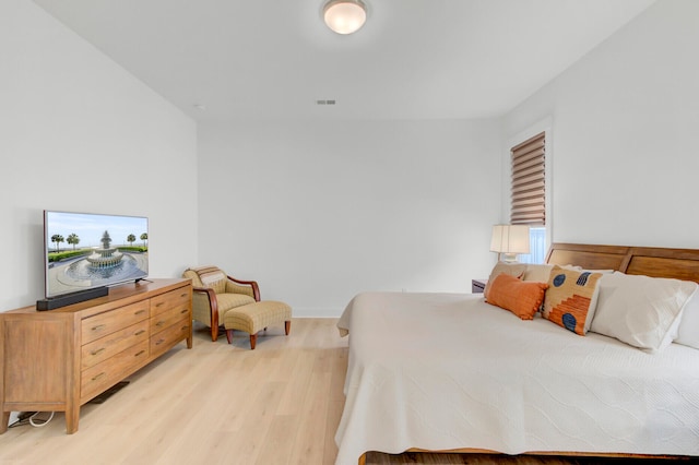 bedroom with light hardwood / wood-style flooring