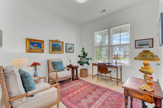 home office with hardwood / wood-style flooring