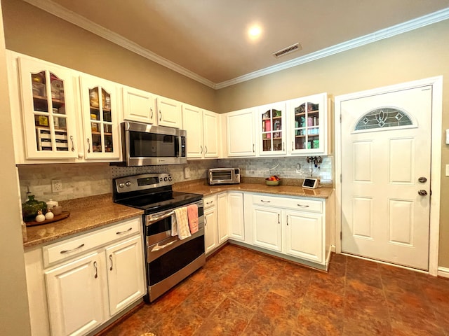 6212 Fieldstone Cir, Charleston, SC 29414 - kitchen with appliances with stainless steel finishes, decorative backsplash, crown molding, glass insert cabinets, and white cabinets