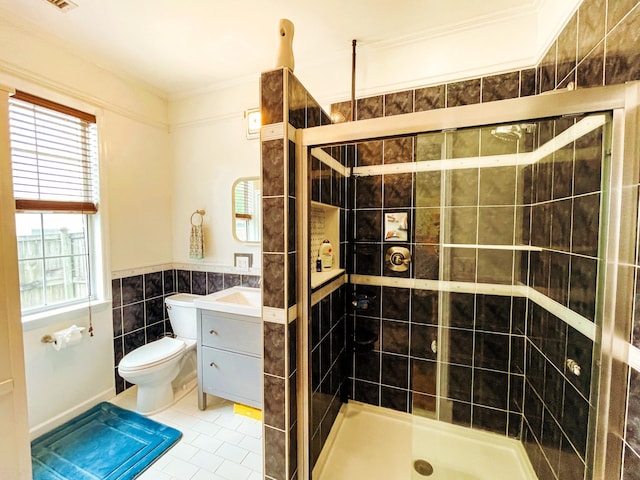 6212 Fieldstone Cir, Charleston, SC 29414 - bathroom featuring toilet, vanity, tile walls, tile patterned floors, and a shower stall