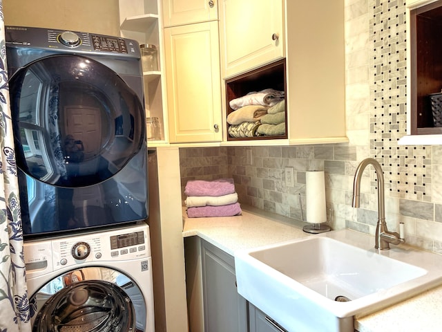 6212 Fieldstone Cir, Charleston, SC 29414 - washroom with stacked washer / dryer and cabinet space