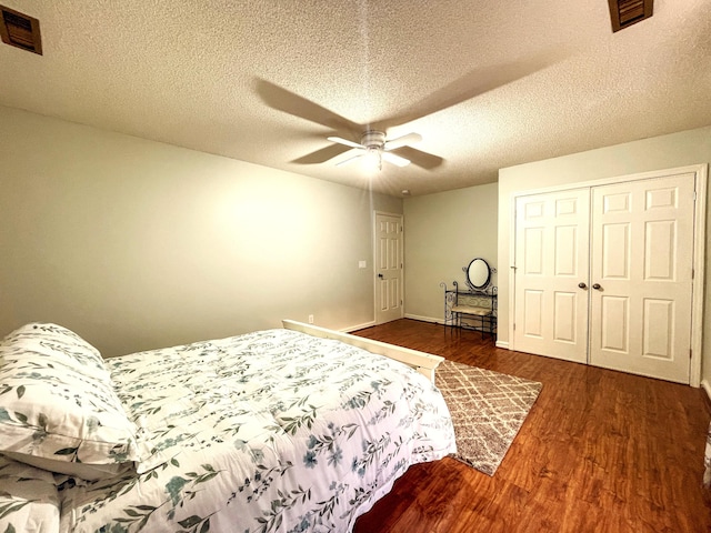 6212 Fieldstone Cir, Charleston, SC 29414 - bedroom with wood finished floors, a closet, a ceiling fan, a textured ceiling, and baseboards