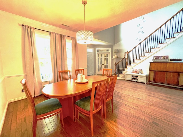 6212 Fieldstone Cir, Charleston, SC 29414 - dining area featuring wood-type flooring, french doors, and stairs