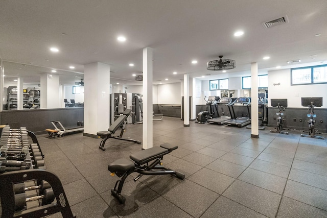 workout area featuring recessed lighting