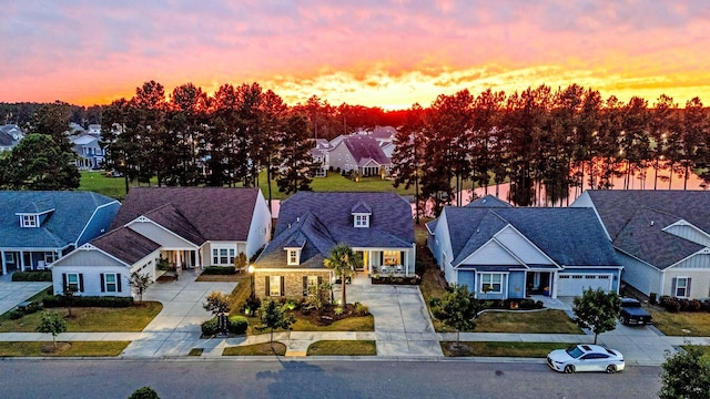 view of front of house featuring a water view