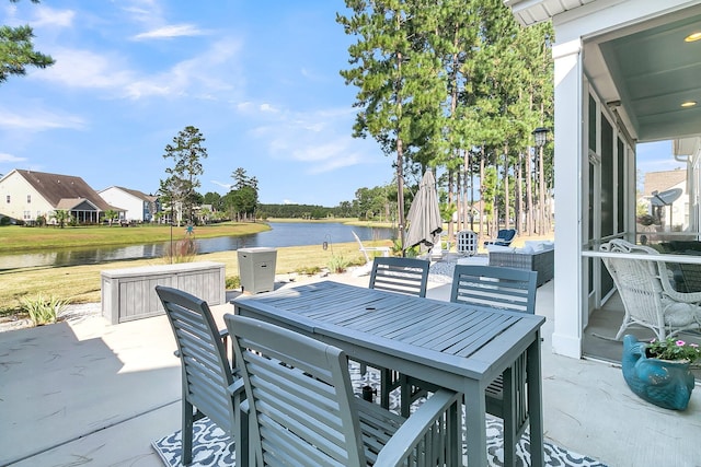 view of patio / terrace with a water view