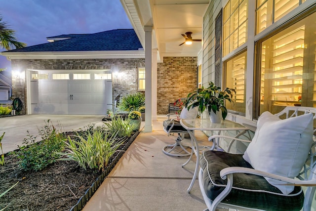 view of patio / terrace featuring a garage