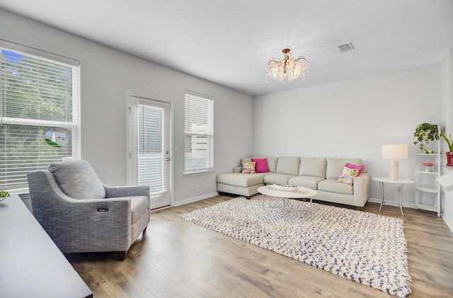 136 Rowans Creek Dr, Charleston, SC 29492 - living area with a chandelier and wood finished floors