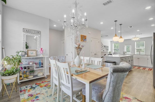 136 Rowans Creek Dr, Charleston, SC 29492 - dining room featuring a chandelier, light wood finished floors, and recessed lighting