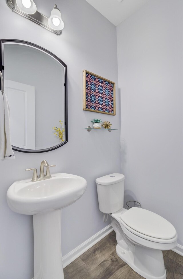136 Rowans Creek Dr, Charleston, SC 29492 - half bath featuring toilet and wood finished floors
