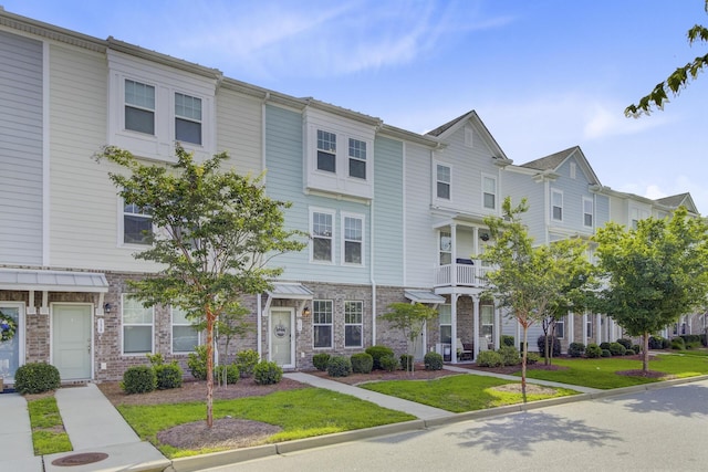 136 Rowans Creek Dr, Charleston, SC 29492 - townhome / multi-family property featuring a front yard