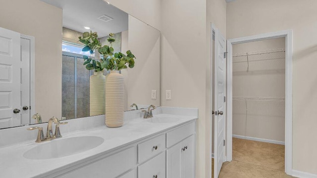 544 Verdi Dr, Summerville, SC 29486 - full bath featuring double vanity, a walk in closet, and tile patterned flooring