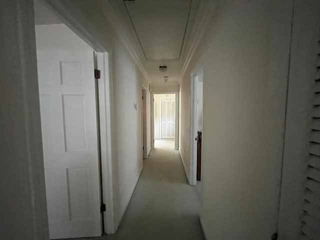 corridor with crown molding