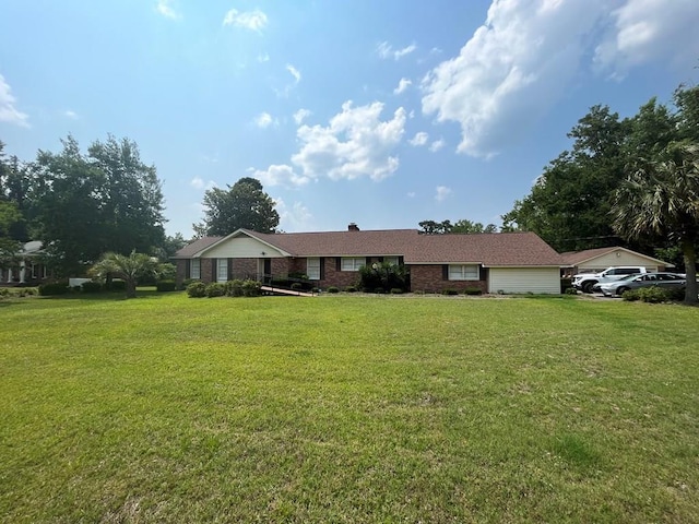 single story home featuring a front yard