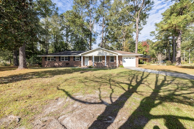 single story home featuring a front yard and a garage