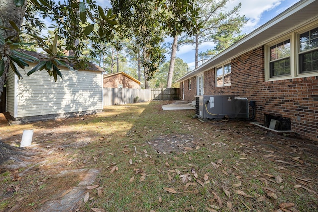 view of yard featuring central AC unit