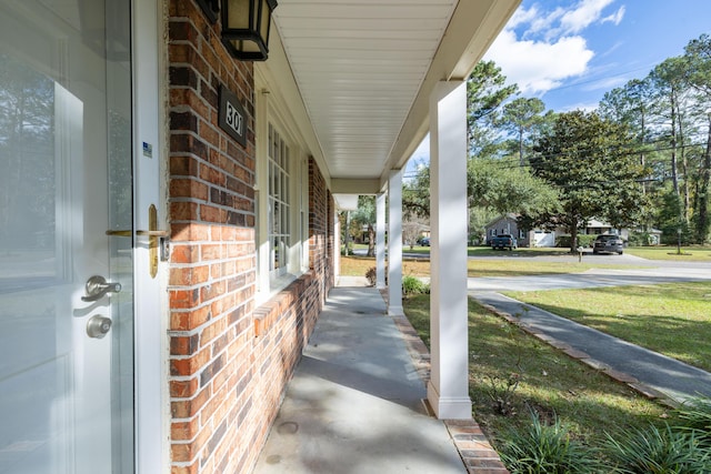 view of patio featuring a porch