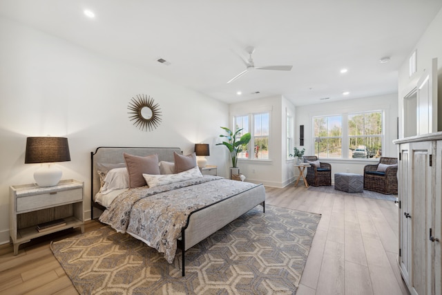 bedroom featuring ceiling fan and wood-type flooring