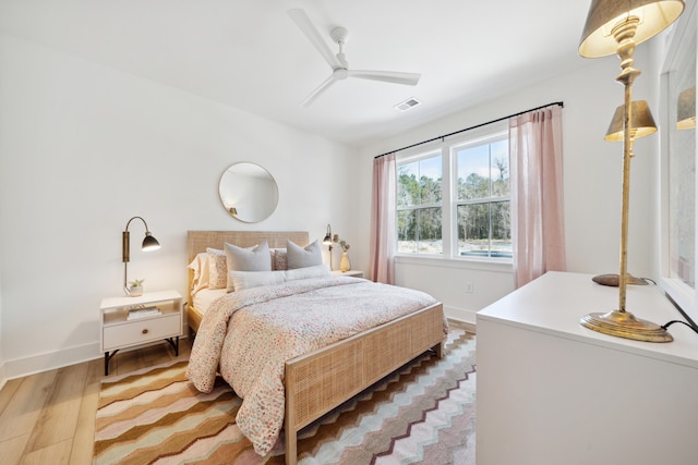 bedroom featuring wood-type flooring and ceiling fan