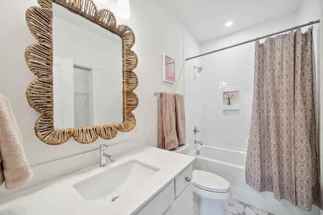 full bathroom featuring shower / bath combination with curtain, vanity, and toilet